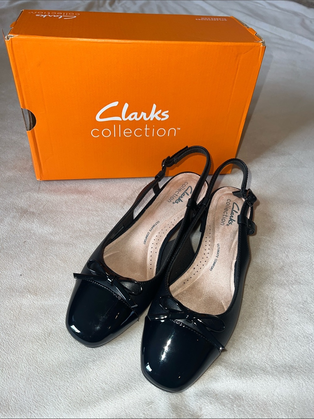 Clarks Iridessa Sling Black Patent Slingback Flats with Bow Accent